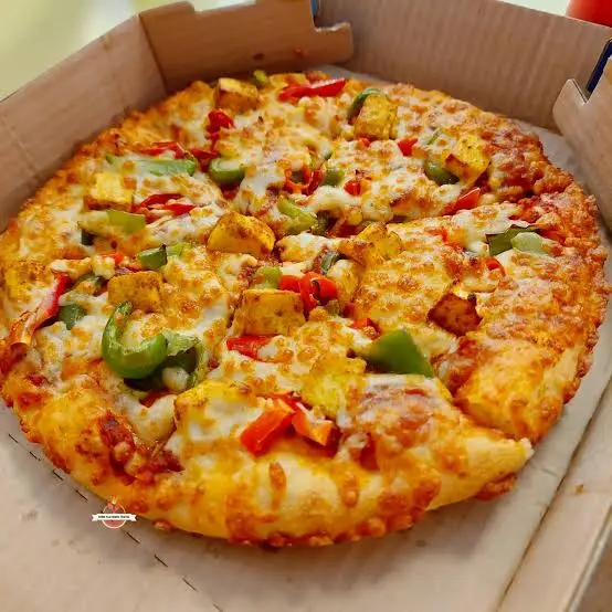 Peppy Paneer pizza By Delicious Pizza 